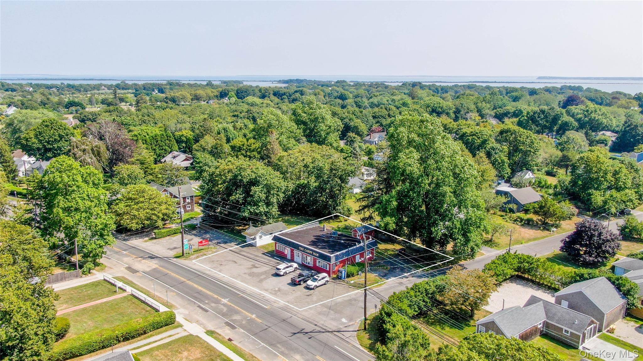 Prime. 21 acre corner location at the intersection of Main Road and Oyster Ponds Lane, just steps from the charm and amenities of Historic Orient Village.