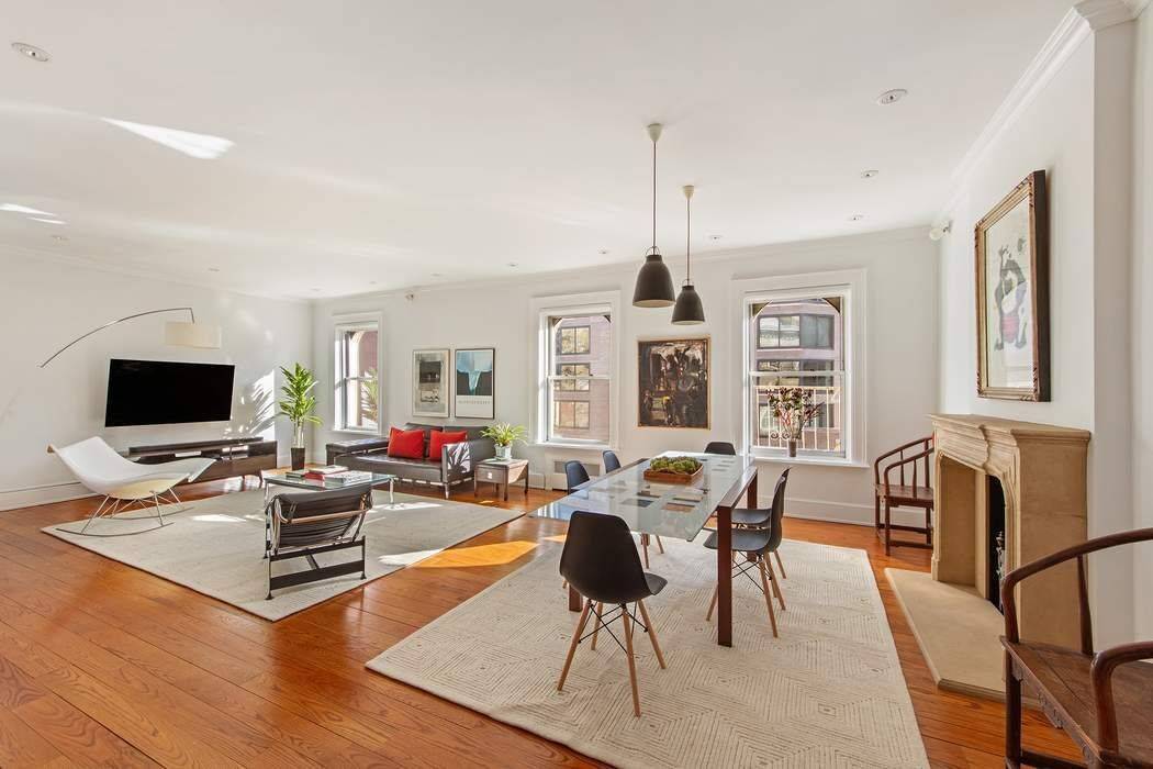 This sun drenched, loft like residence in the heart of Carnegie Hill is defined by extraordinary scale, light, and classic prewar elegance.