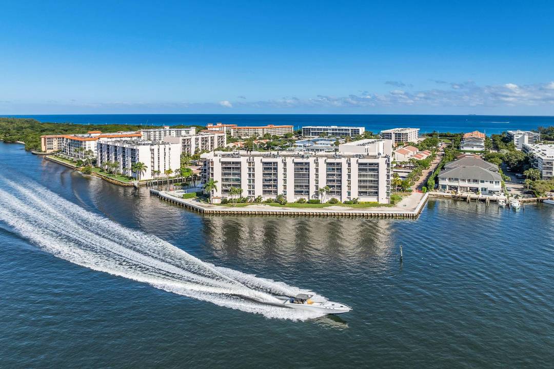 Experience the pinnacle of waterfront luxury in this stunning, meticulously remodeled unit located in the sought after F bldg of the Yacht and Racquet Club of Boca Raton.