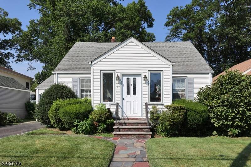 Welcome to this delightful Cape Cod style home nestled in the sought after Newton Park section of Sunnyside.