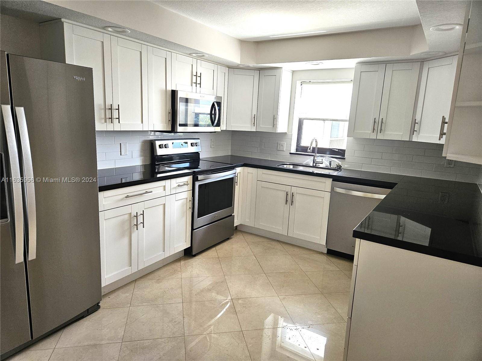 Wonderful penthouse corner unit with panoramic views of the golf course and lakes !