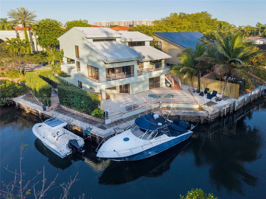 Rare opportunity to own a prime Coconut Grove waterfront home with direct bay access and no bridges to the bay.