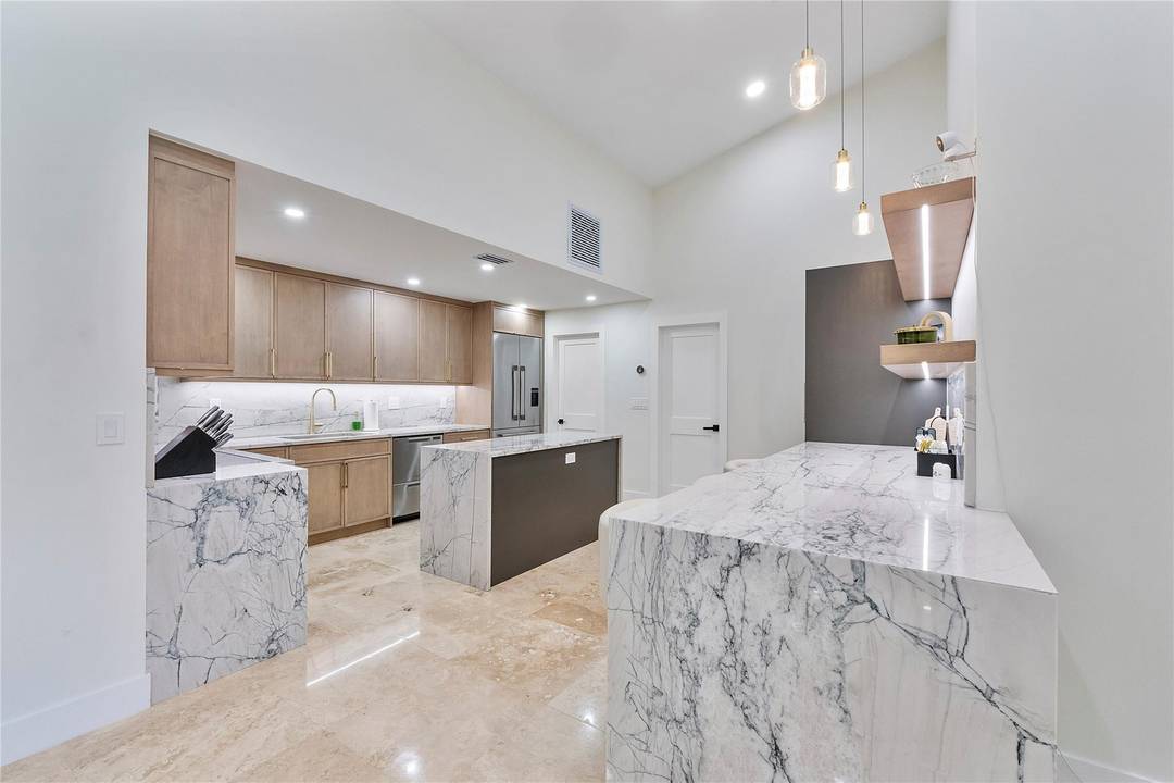 Stunning home located in the highly sought after Boca Woods community.