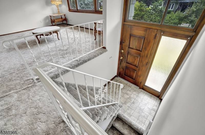 Discover the charm of Pompton Plains living in this well kept bi level residence set on an expansive 125x132 property.