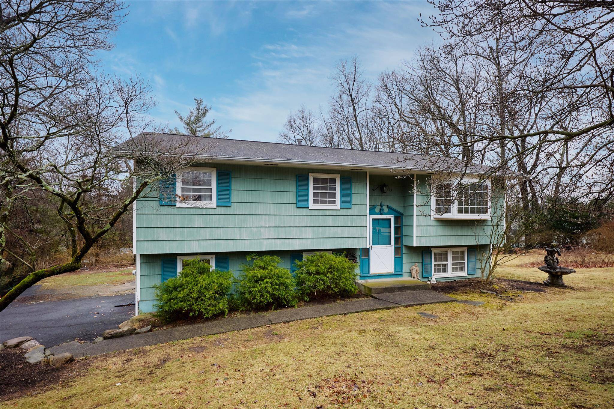 Escape to tranquility in this inviting hi ranch home, perfectly positioned at the end of a quiet cul de sac in Suffern, NY.