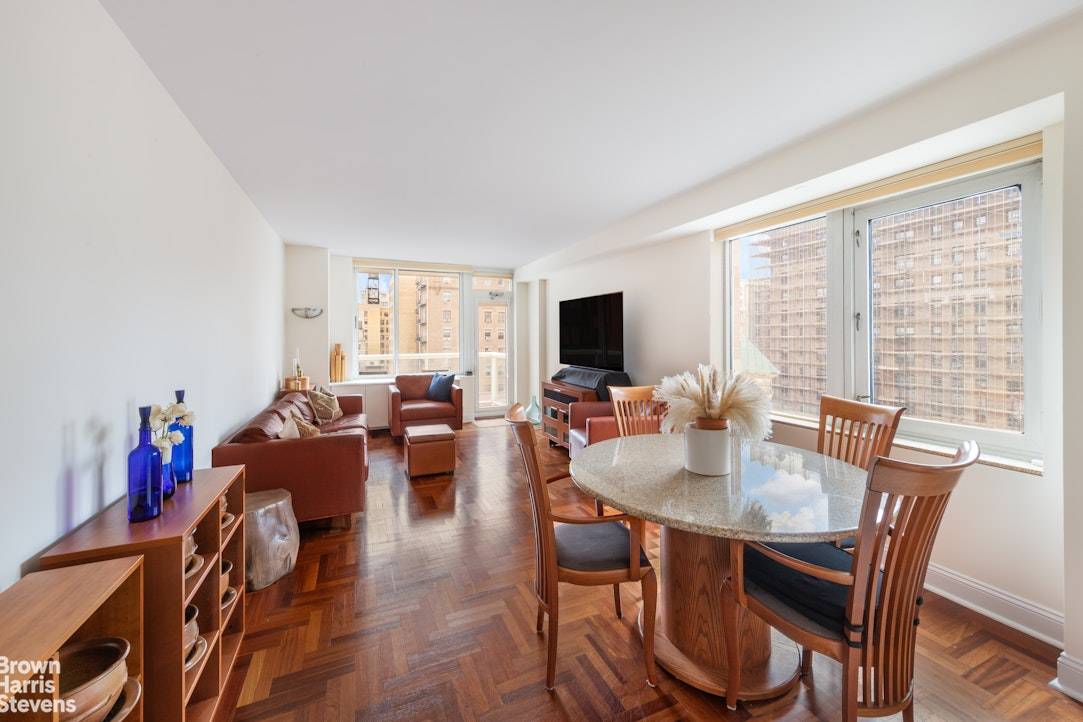 Corner, Split 2 bedroom, 2 bath home with three exposures to the South, West and North including a south facing balcony !