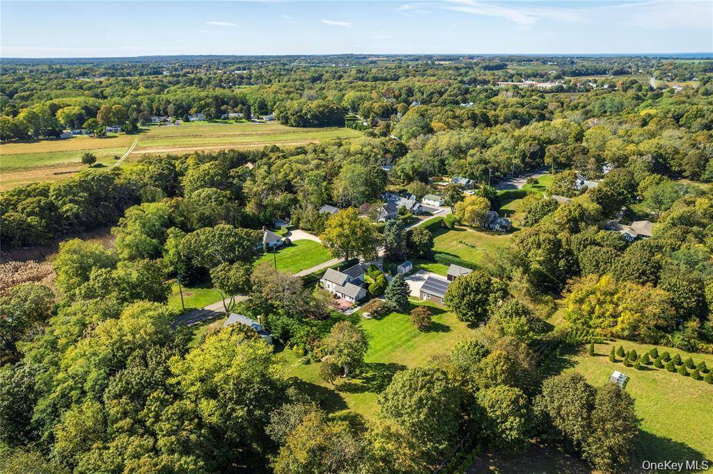 Set on 1. 16 acres of beautifully landscaped grounds, this charming and nostalgic property offers exceptional privacy and endless possibilities.