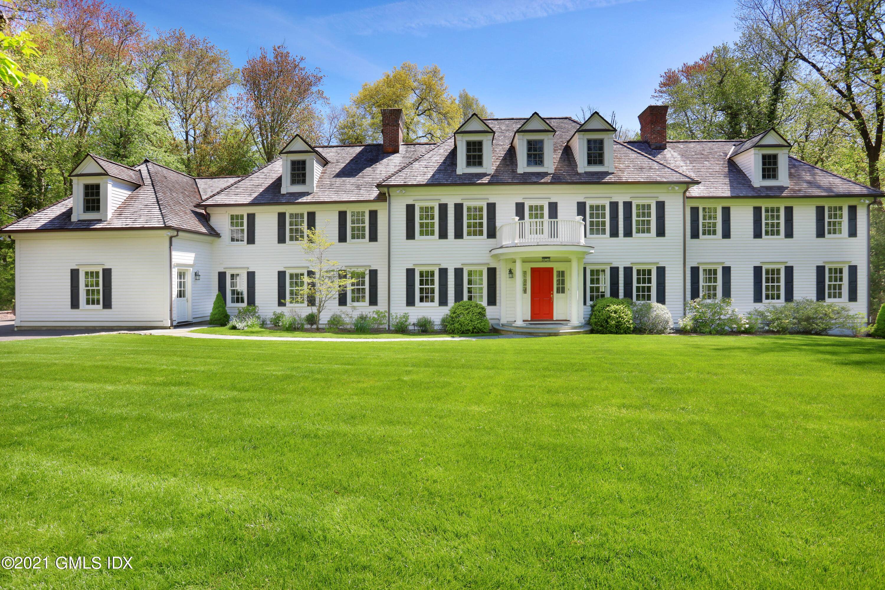 Beautifully renovated classic colonial on 2 acres in a coveted location close to town.