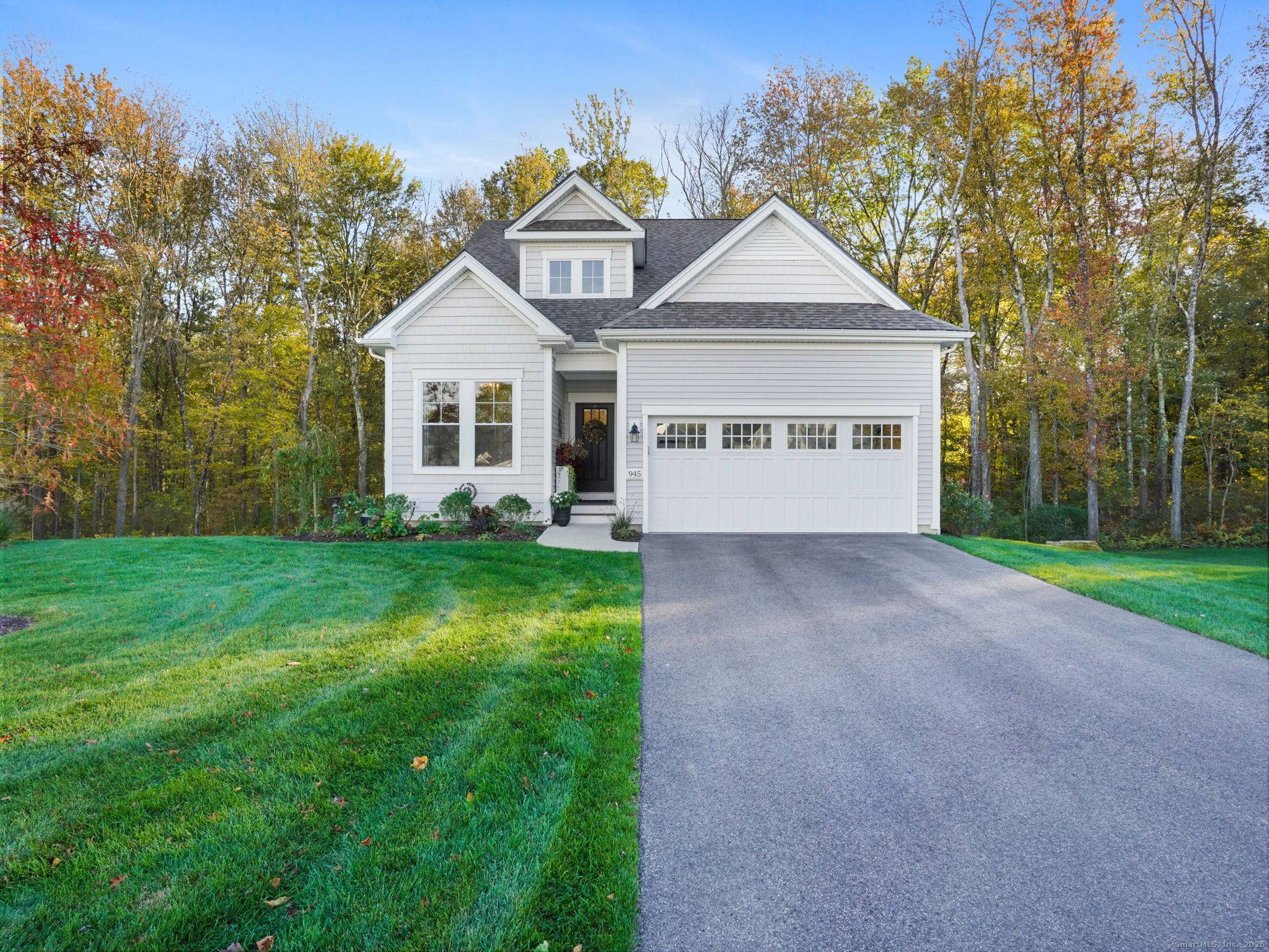 Better than new ! Welcome to 945 Mackenzie Lane, a beautifully upgraded residence in Oxford Greens' premier 55 community, where refined living meets resort style amenities.