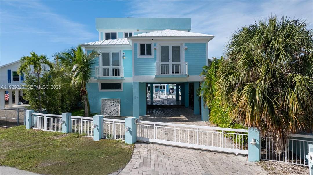 Three level, 4 bed 4 bath home has a private third floor master suite with a large den and balcony.