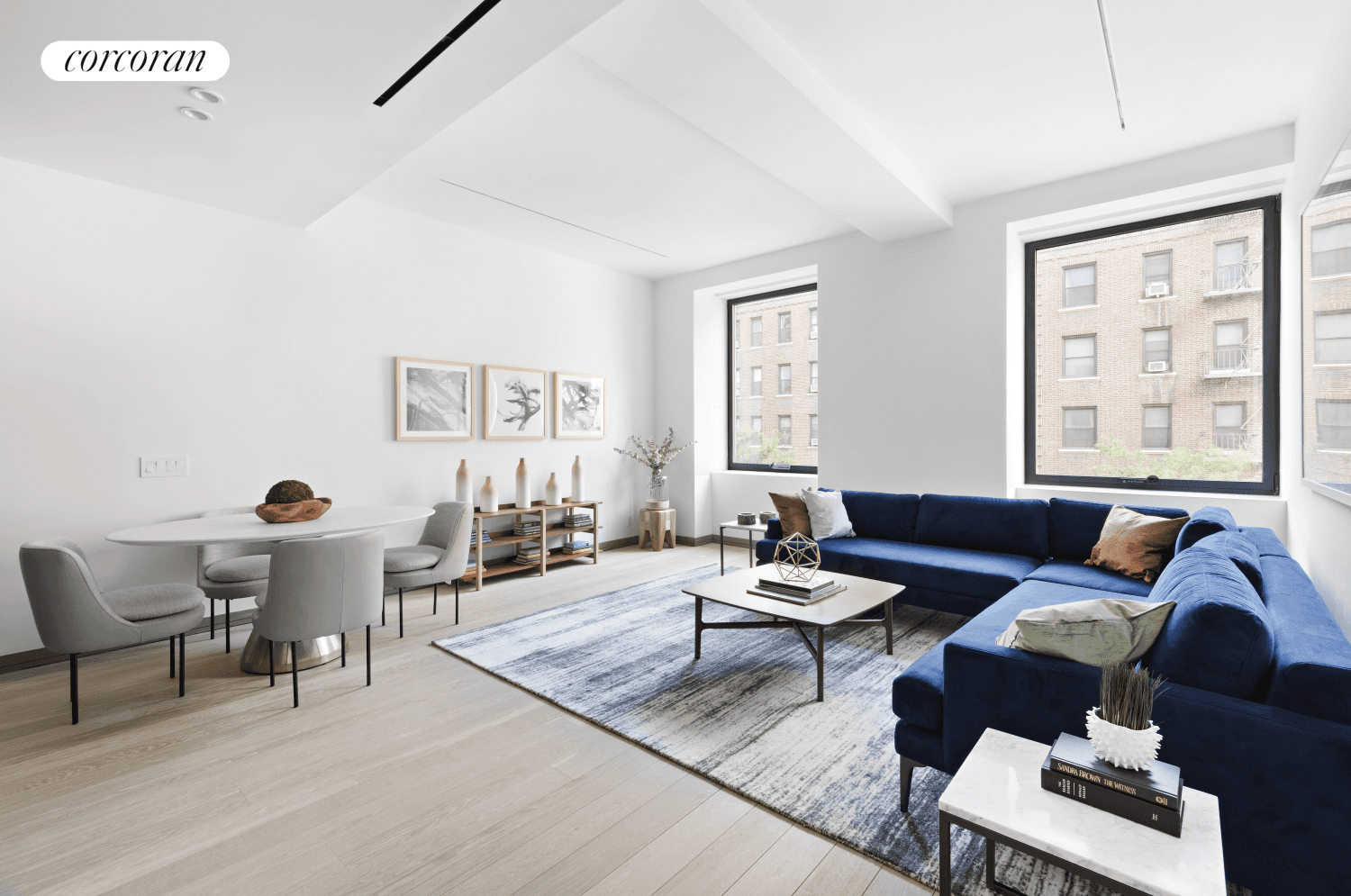 IMMEDIATE OCCUPANCY ! This two bedroom, two and a half bath residence features dramatic 10' ceilings and oversized windows with eastern exposures bathing each room in natural light.