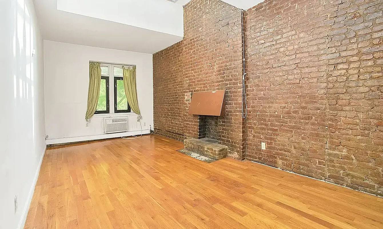 Stunning Brownstone located just off Park Avenue on a beautiful tree lined streetApartment Features Huge Skylight High Ceilings Hardwood Floors Large Living Area Roughly 10 21 Beautiful Exposed Brick Fireplace ...