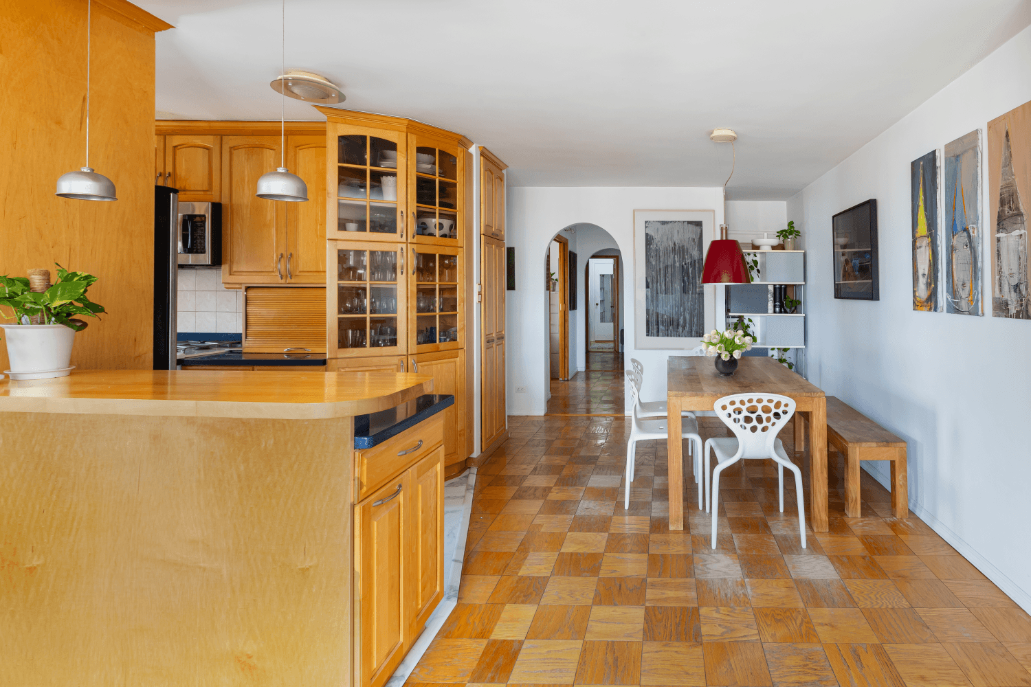 This rare, corner two bedroom, two bathroom home offers sweeping skyline views over the historic Lower East Side.