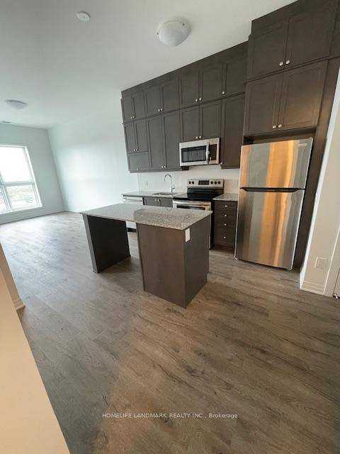 Mattamy 1 1 Den, 1 Parking amp ; 1 Locker 10 Feet Top Floor, Enclosed Glassed Balcony, Facing South, carpet free, full of sunshine.