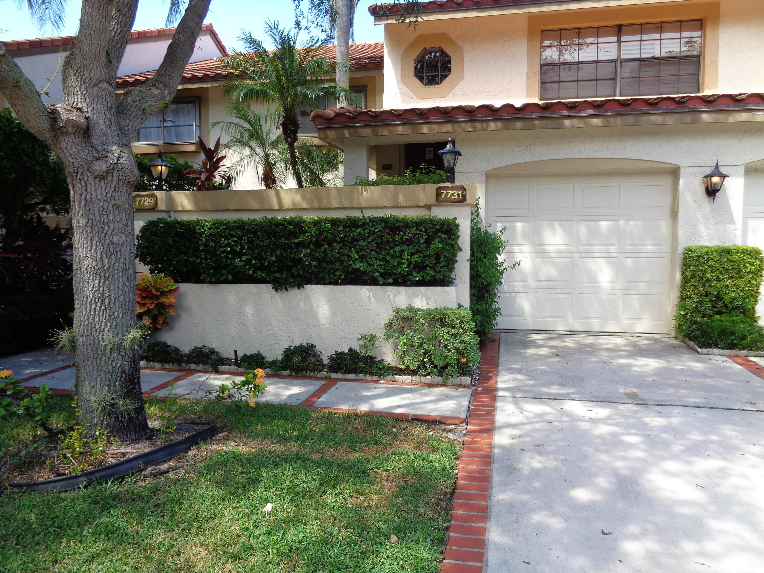 Rare opportunity to purchase an all age, updated 1st floor unit with beautiful water views a garage located in Boca Pointe Country Club.