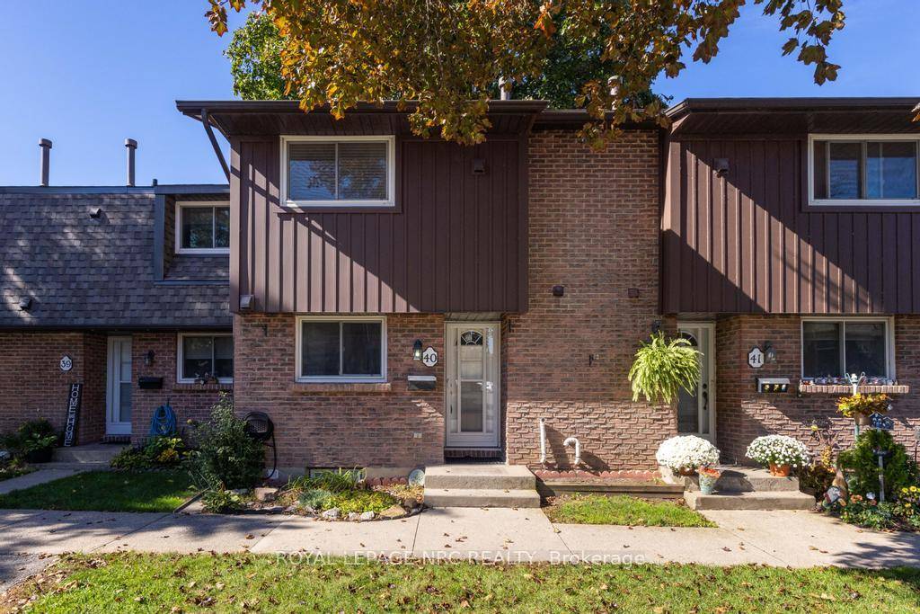 Tucked away in a quiet, well kept complex surrounded by mature trees and gardens, this move in ready townhouse offers comfort, convenience, and an unbeatable location.