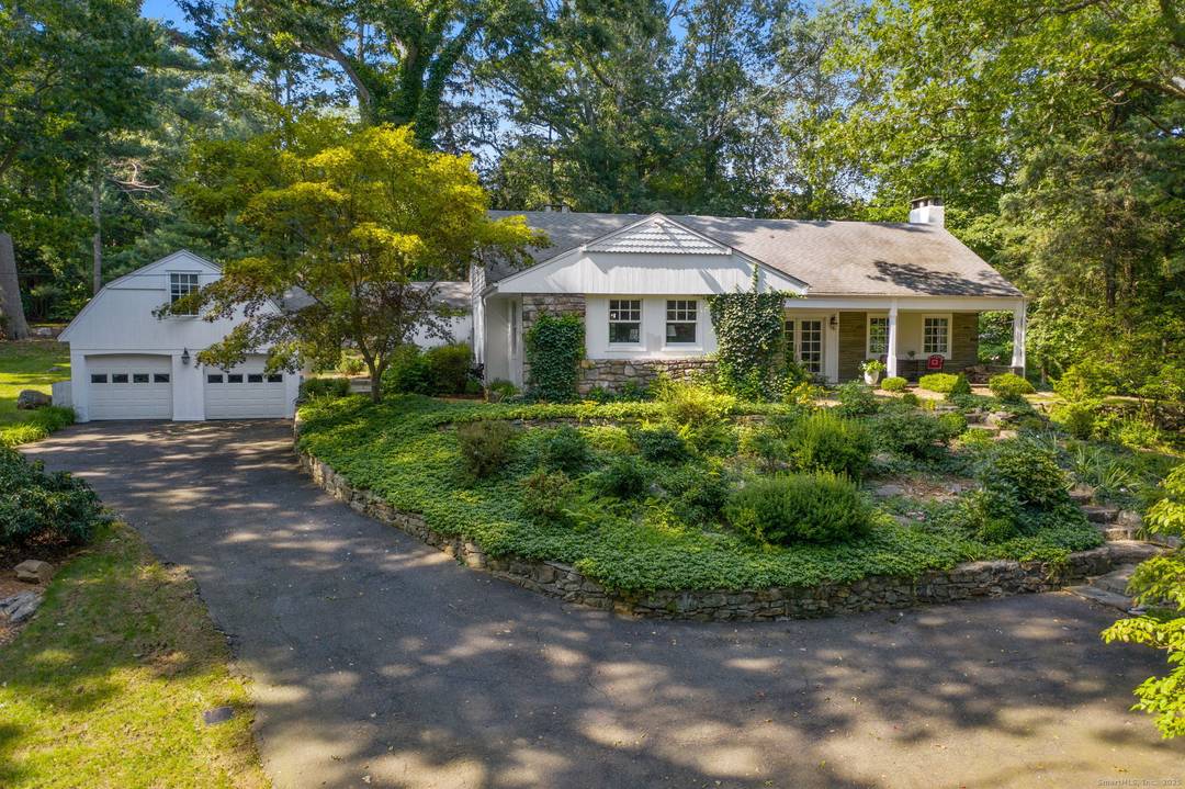 This enchanting retreat is nestled in the heart of sought after South Wilton.