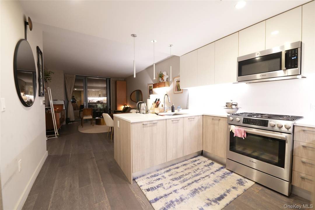 Welcome to this beautifully appointed two bedroom condo in the prestigious Sky View Parc community.