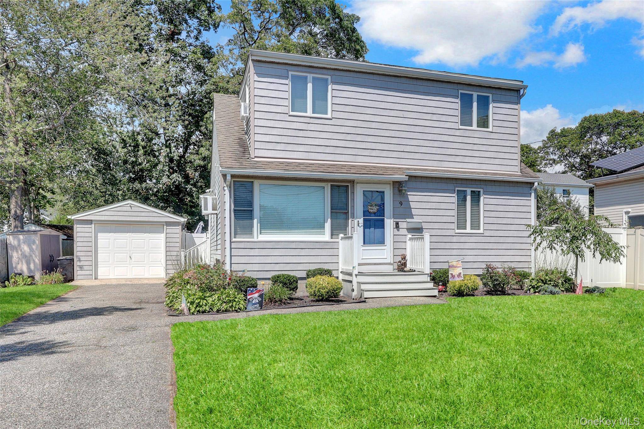 Welcome home ! Feel the love and energy put into this home featuring hardwood floors and warm tones throughout.