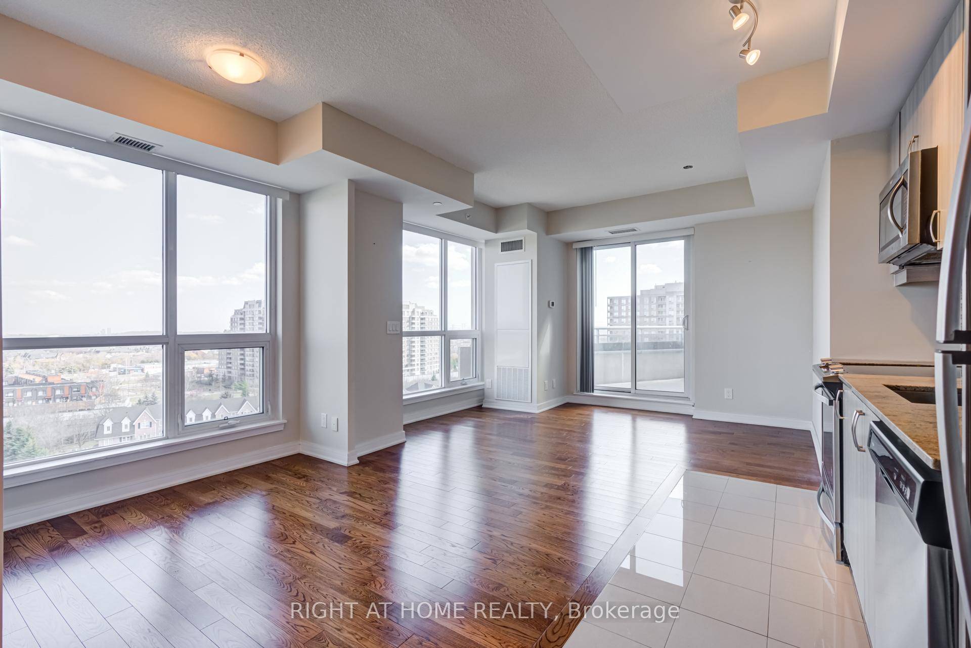 Stunning Sun Filled Spacious Modern 1 1 Bdrm Corner Unit Condo with Unobstructed Panoramic Views In Beverly Hills, One Of The Most Prestigious Condominium In Richmond Hill ; One Of ...