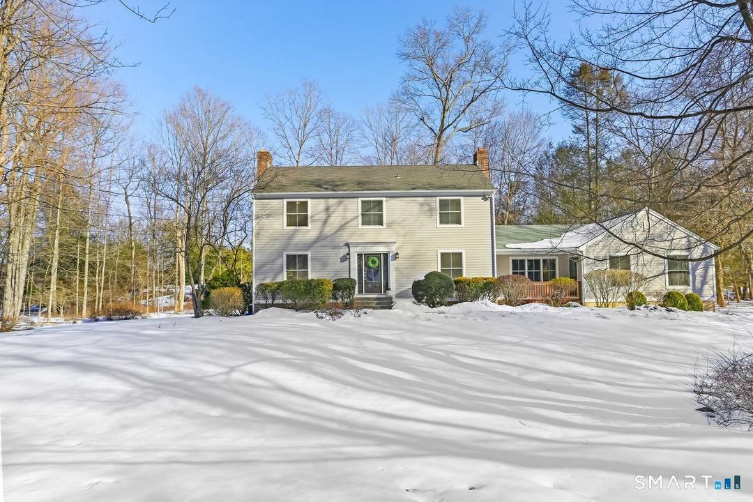 Quintessential center hall Colonial just minutes from the heart of town and top rated schools, this charming home offers 5 bedrooms and 2.