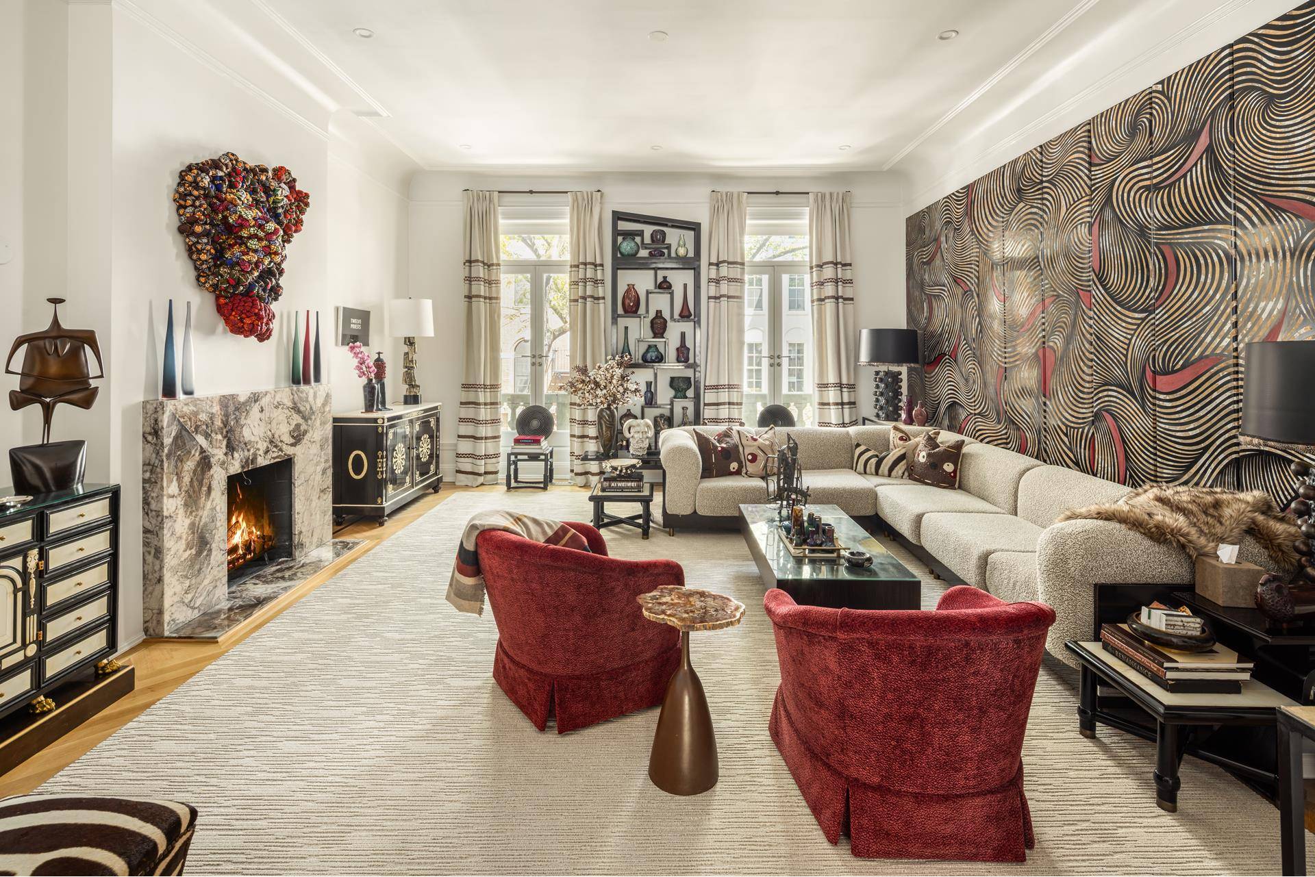 Situated on one of Manhattan's most coveted tree lined streets, this stunning 1910 Beaux Arts style limestone and brick townhouse spans five floors, offering five bedrooms, four full bathrooms, and ...