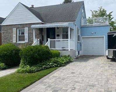 Spacious and well maintained 4 bedroom, 3 full bath home in the heart of New Hyde Park !