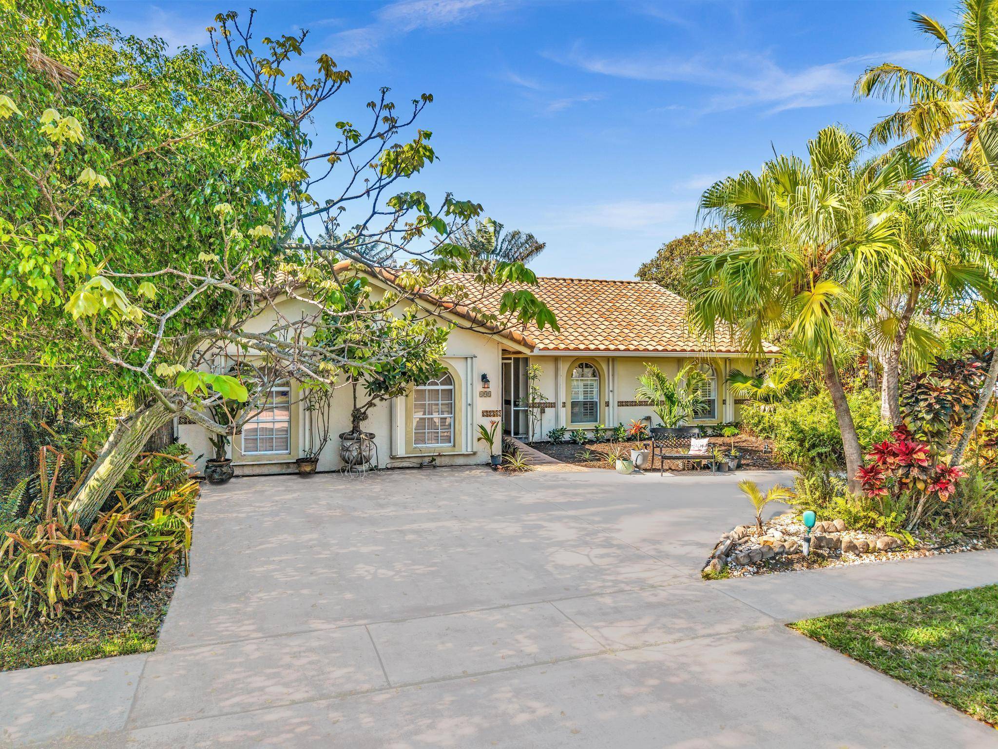Come See this beautifully updated single story estate nestled in the sought after Hidden Valley neighborhood of Boca Raton.