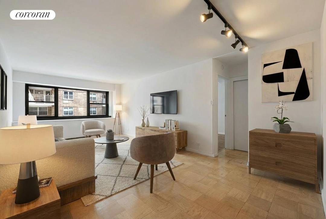 Welcome to this spacious one bedroom residence in a full service Upper East Side cooperative, offering exceptional quiet and comfort.