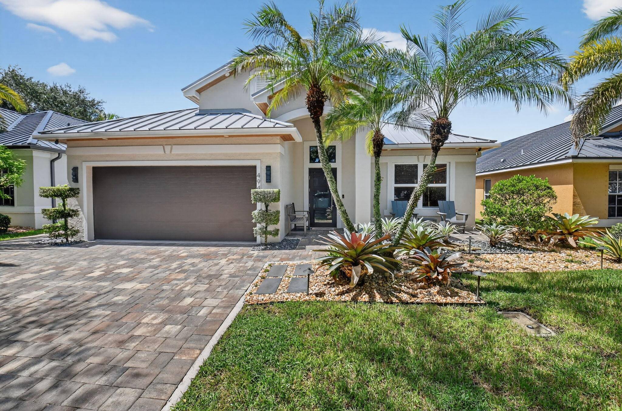 Recently remodeled, this modern open concept Delray Beach home blends luxury and function.