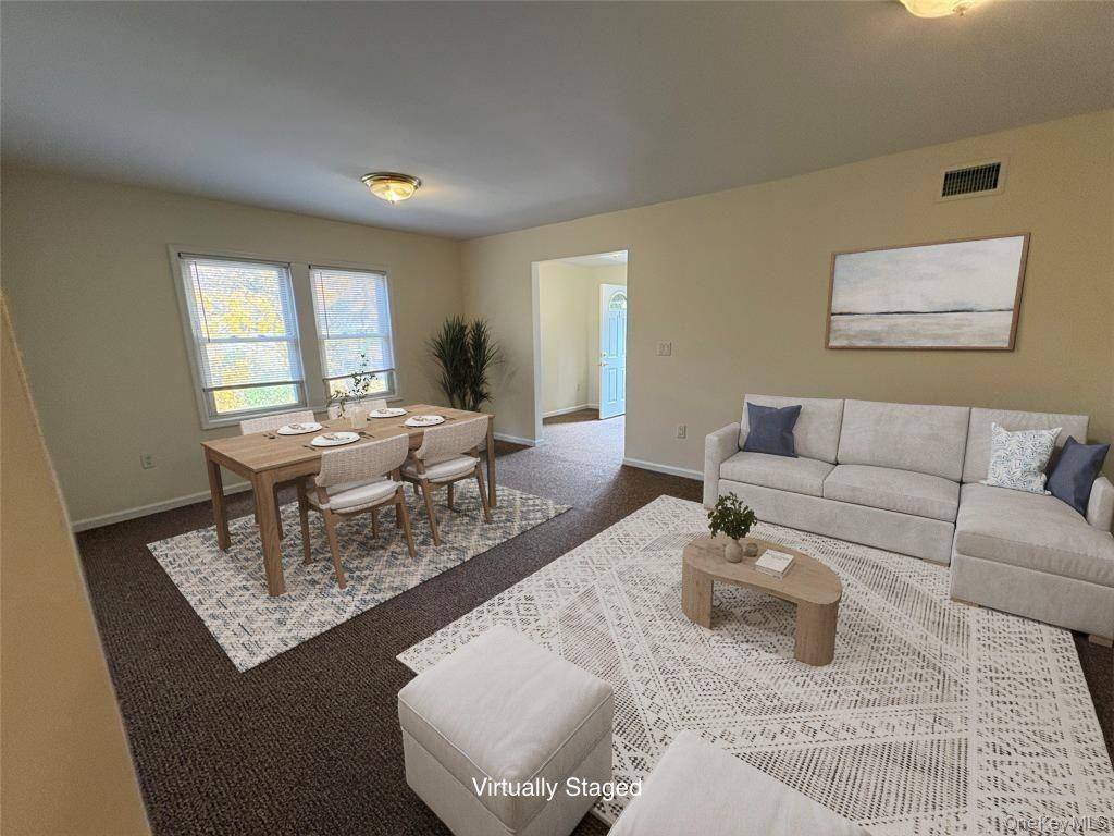 Welcome to this bright and freshly painted first floor apartment in the heart of Glen Head.