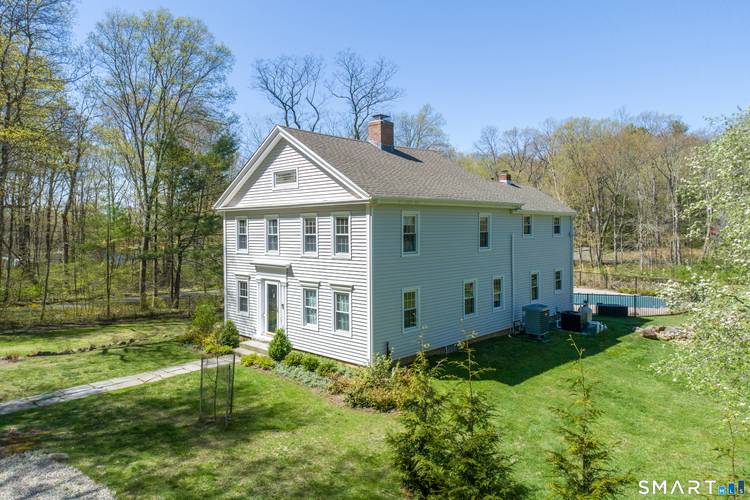Discover the perfect blend of antique charm and modern convenience at 50 Ledge Hill Road.