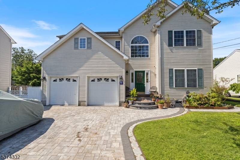 Welcome to this beautifully maintained Colonial style home, built in 2001 and nestled in a desirable neighborhood.