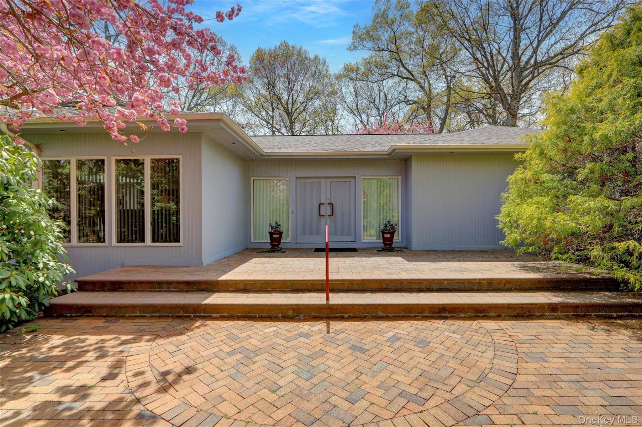 Set on 1. 2 beautifully landscaped acres in the sought after Village of Belle Terre, this one of a kind 3, 300 sq ft home features a dramatic entry with ...