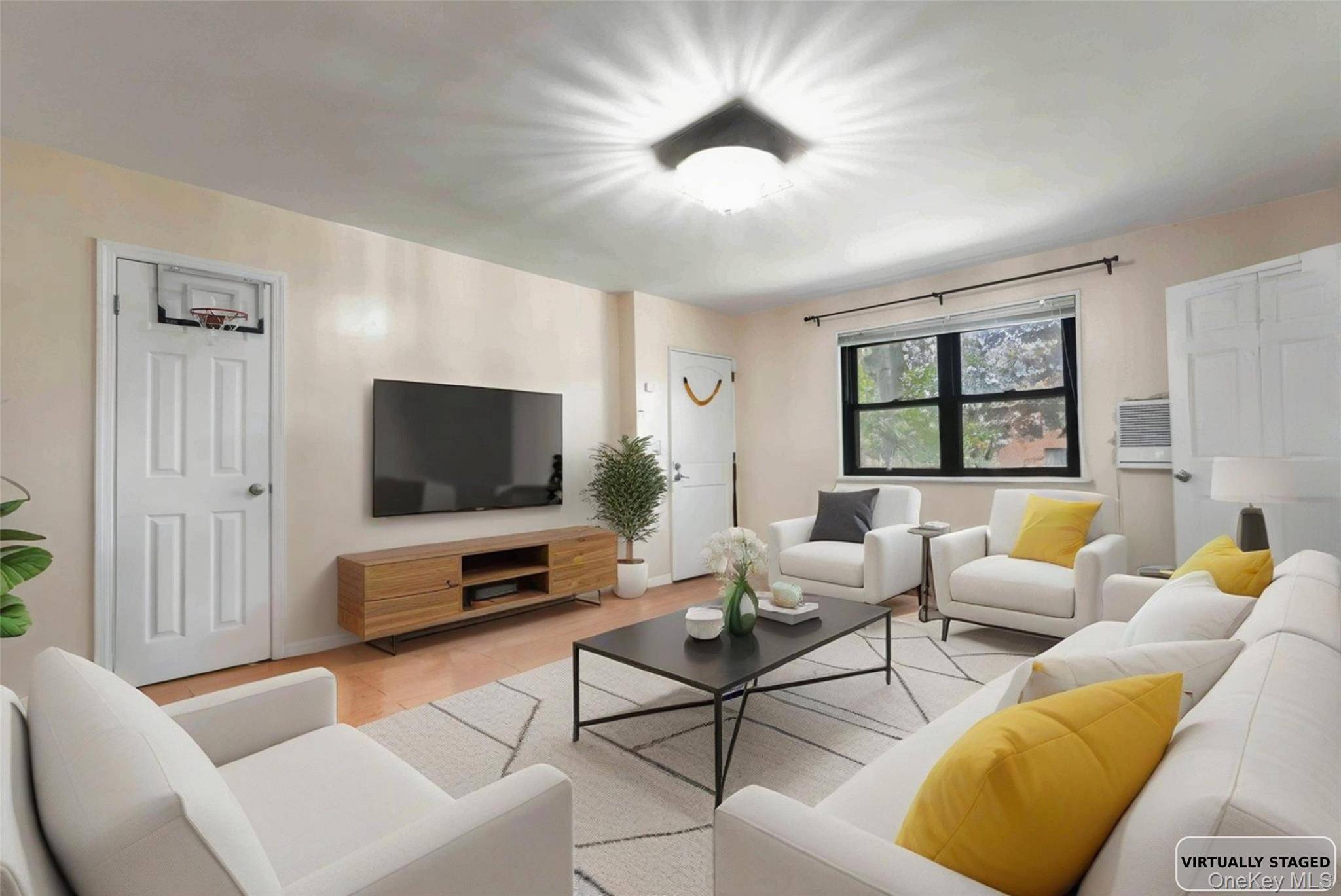Bright and sunny, this meticulously renovated lower corner 2 bedroom co op is tucked away in a peaceful, tree lined, drive in courtyard.