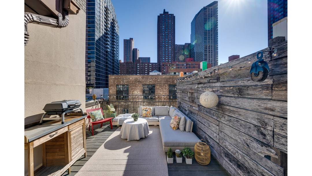Welcome home to this stunning pre war duplex penthouse with private roof terrace, spanning the top two floors of an elevator building on the Upper East Side.