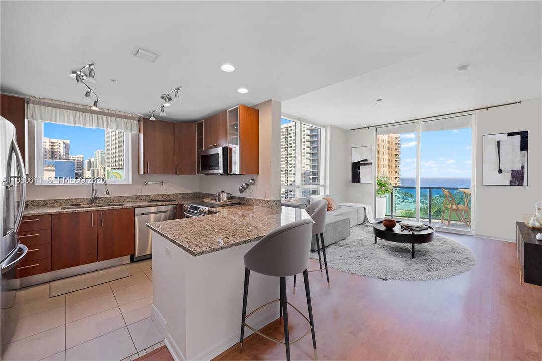 Discover luxury living in this 2 bedroom, 2 bathroom corner unit just steps from the beach.