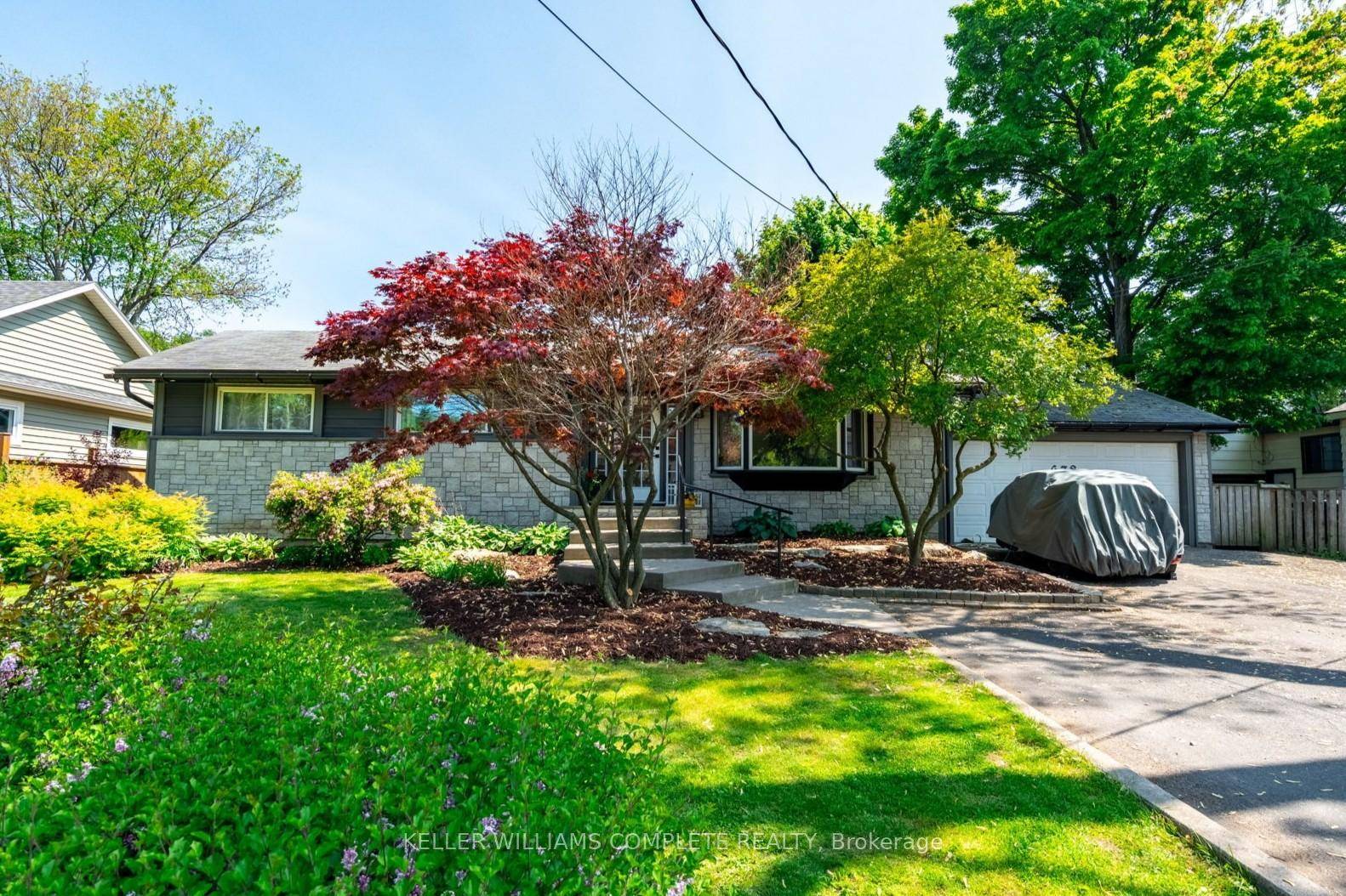 Welcome to 678 Mohawk Road a fully renovated bungalow featuring exceptional flexibility and charm.