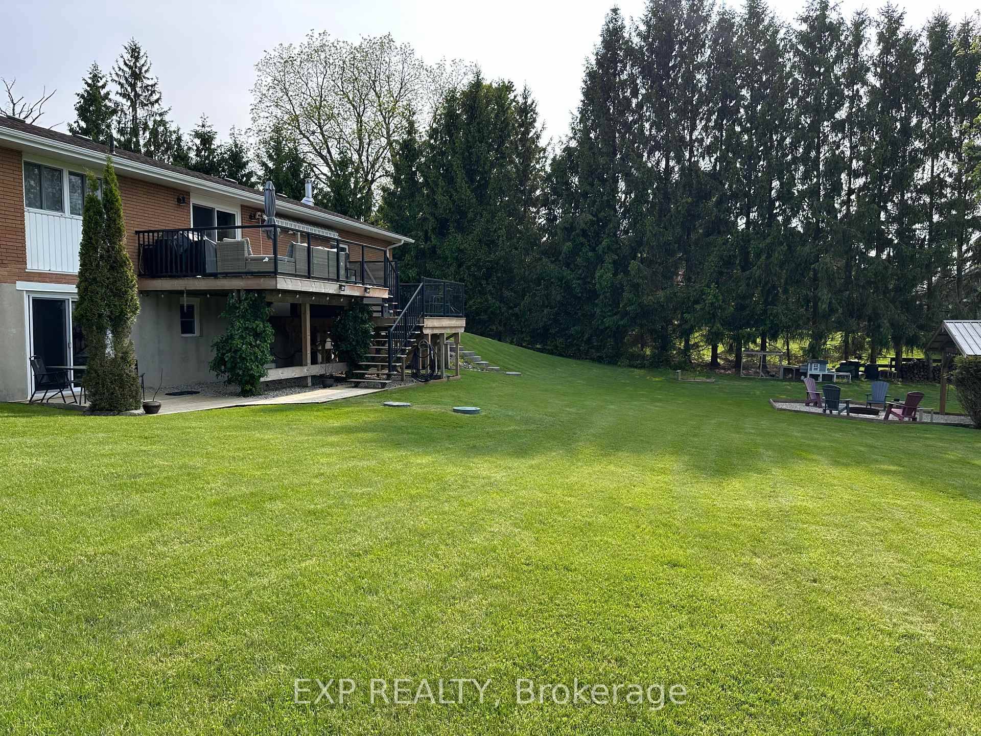 Discover the charm of this 1500 square foot bungalow nestled on 1.