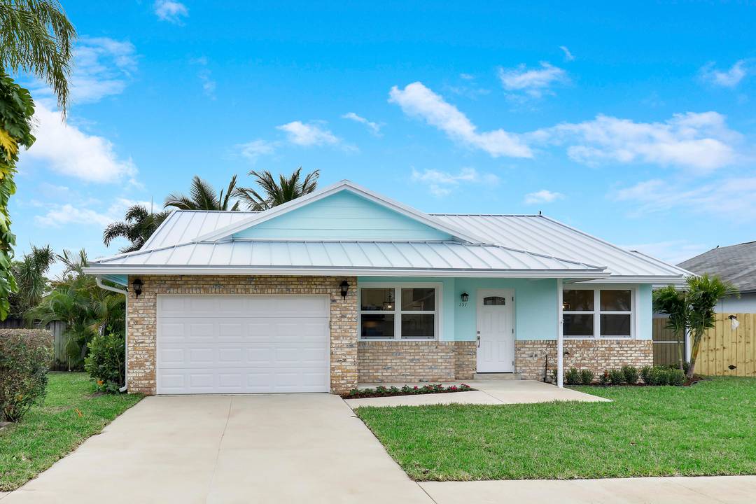 Completely renovated 3 bedroom, 2 bath home with a spacious 2 car garage, located in the heart of Jupiter.