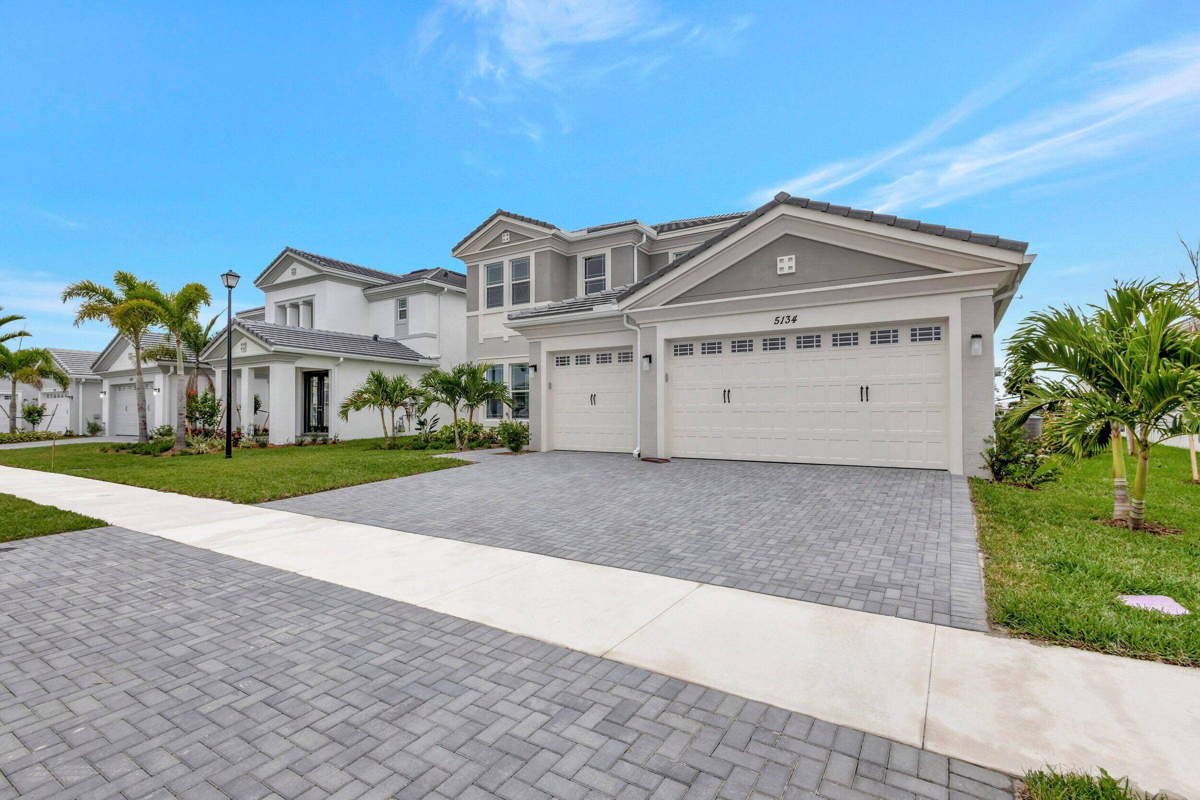 This Tanager Grand home is located in the Orchards of Westlake by Minto Communities.