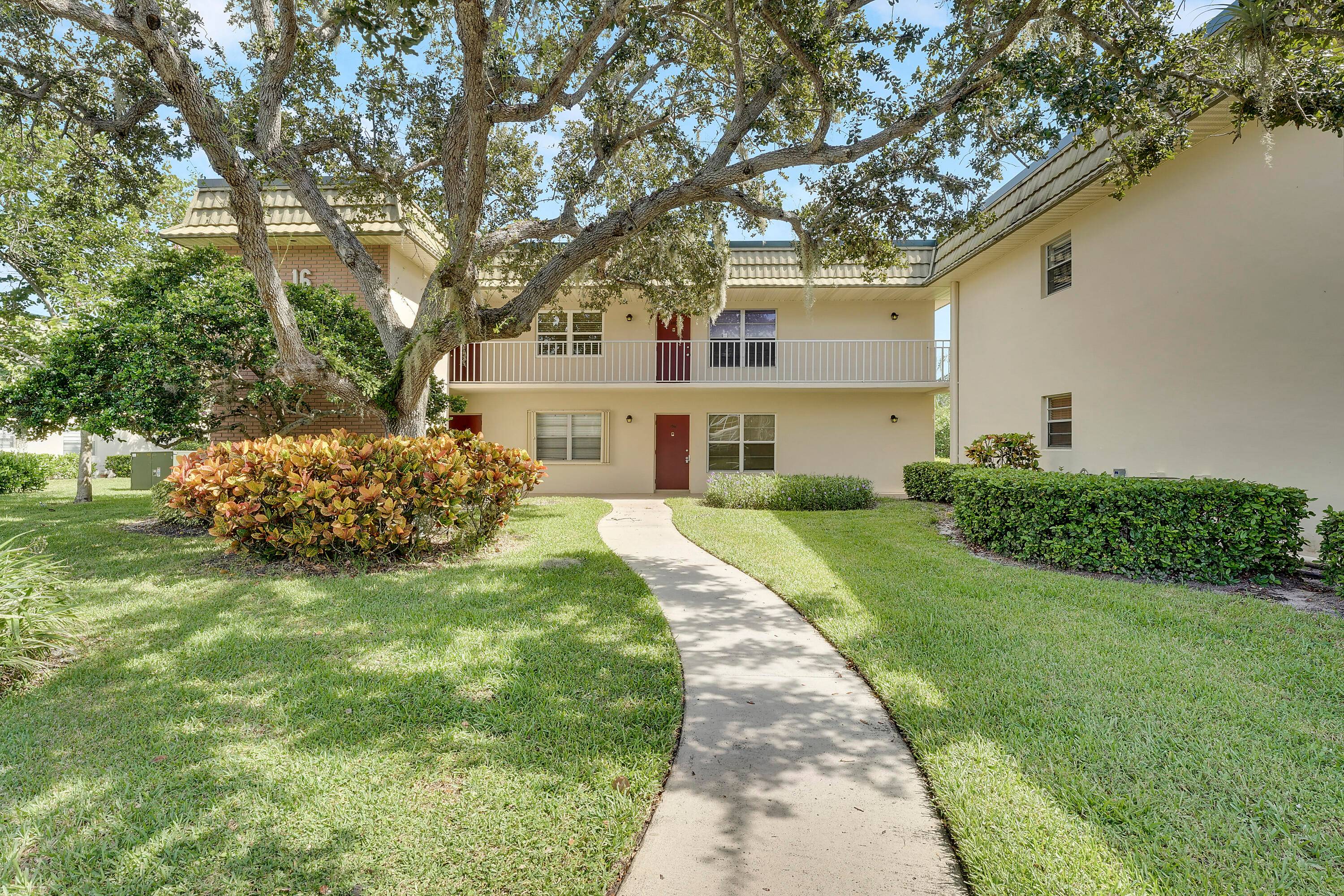 Ideally located near US 1 Indian River Blvd, Vista Gardens offers a serene setting surrounded by lush landscaping and mature foliage.