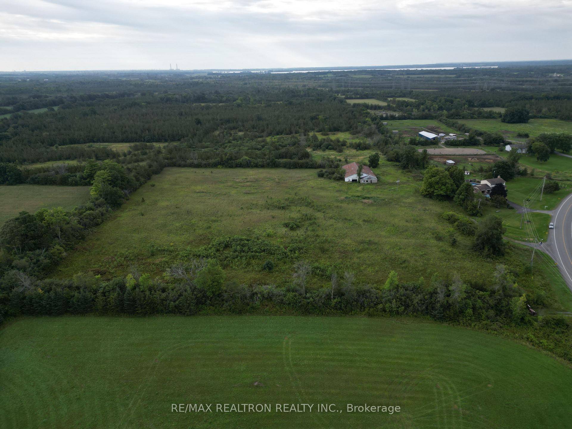 This is a rare and versatile opportunity to acquire a prime piece of commercial real estate land with a unique blend of zoning options including Farm, Warehouse, Residential, and Rural ...