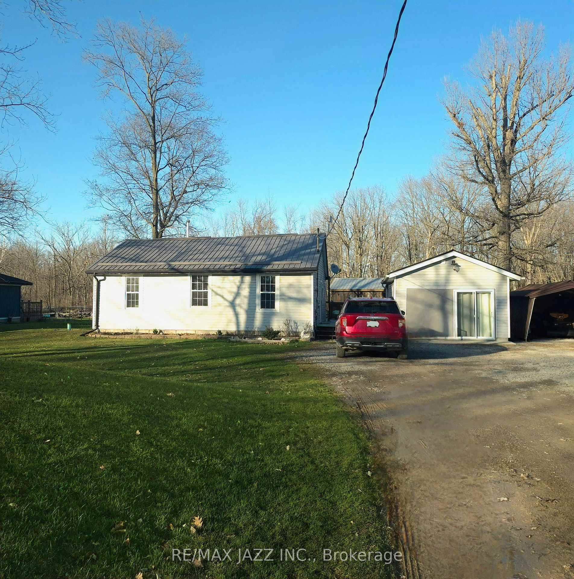 Opportunity Knocks ! Spectacular Year Round Waterfront living in this 3 bedroom bungalow on a double lot with over 133 ft.