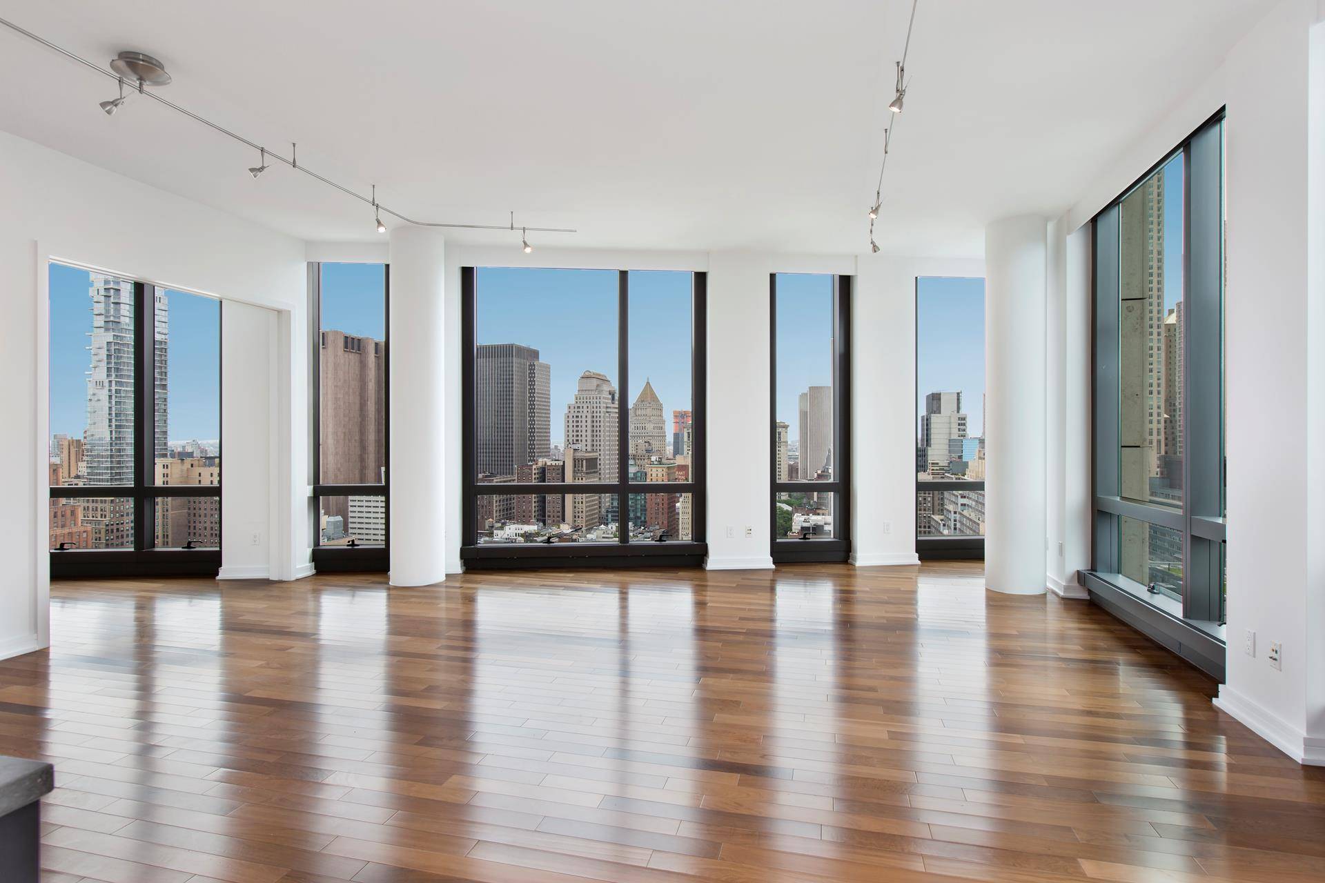 This magnificent 3 bedroom, 3 bathroom SE corner residence spans 2, 180 square feet and offers breathtaking city skyline views through expansive walls of glass.