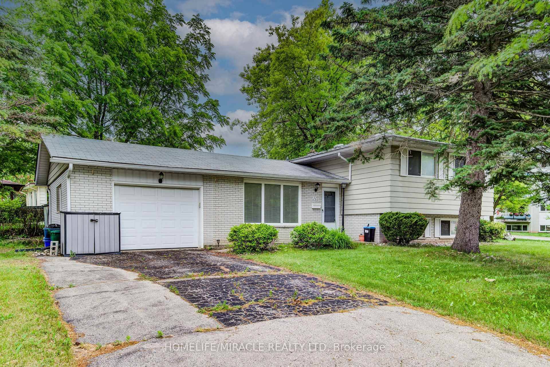 This charming side split 3 bedroom, 2 washroom bungalow on a premium corner lot offers unbeatable value with its prime location just minutes from Laurier University under 3 km and ...