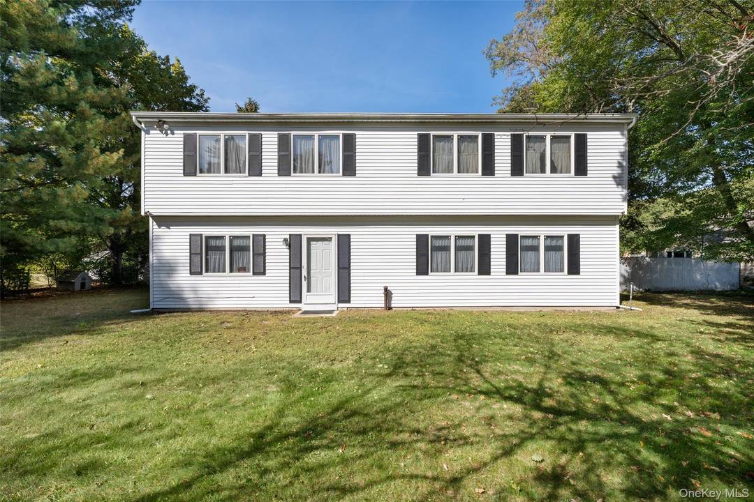 Large Colonial on. 94 Acre built in 1976 and added onto in 1987 with second floor.