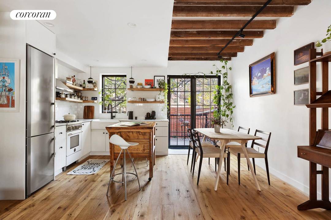 A Rare Parkside Gem with Private Parking Directly overlooking Cooper Park in Williamsburg, this beautifully reimagined single family townhouse blends modern design with a sense of warmth and comfort.