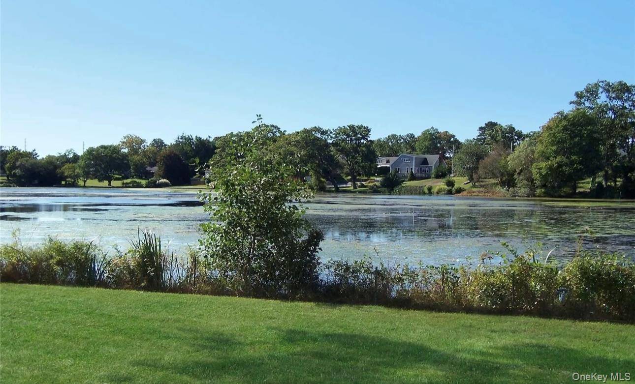 LAKE FRONT HOME ON A CUL DE SAC IS CALLING YOU.