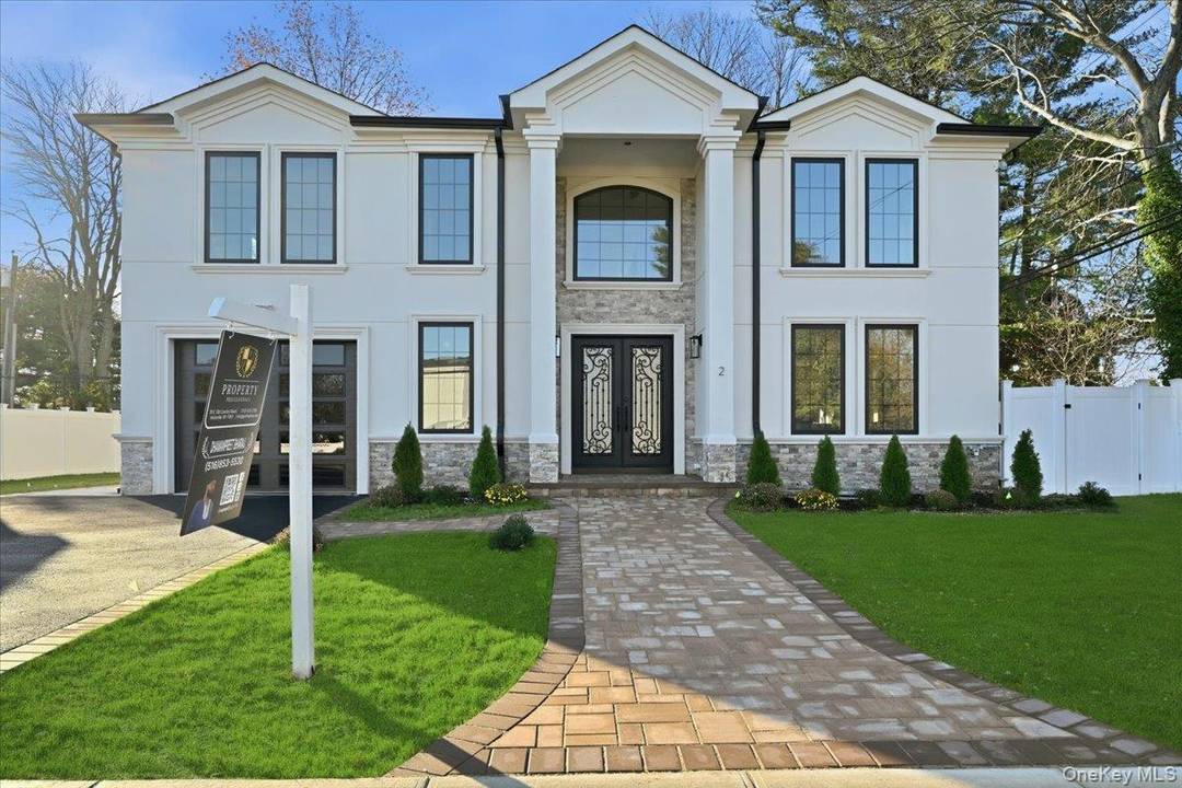 Welcome to this stunning Colonial featuring 5 spacious bedrooms and 4.